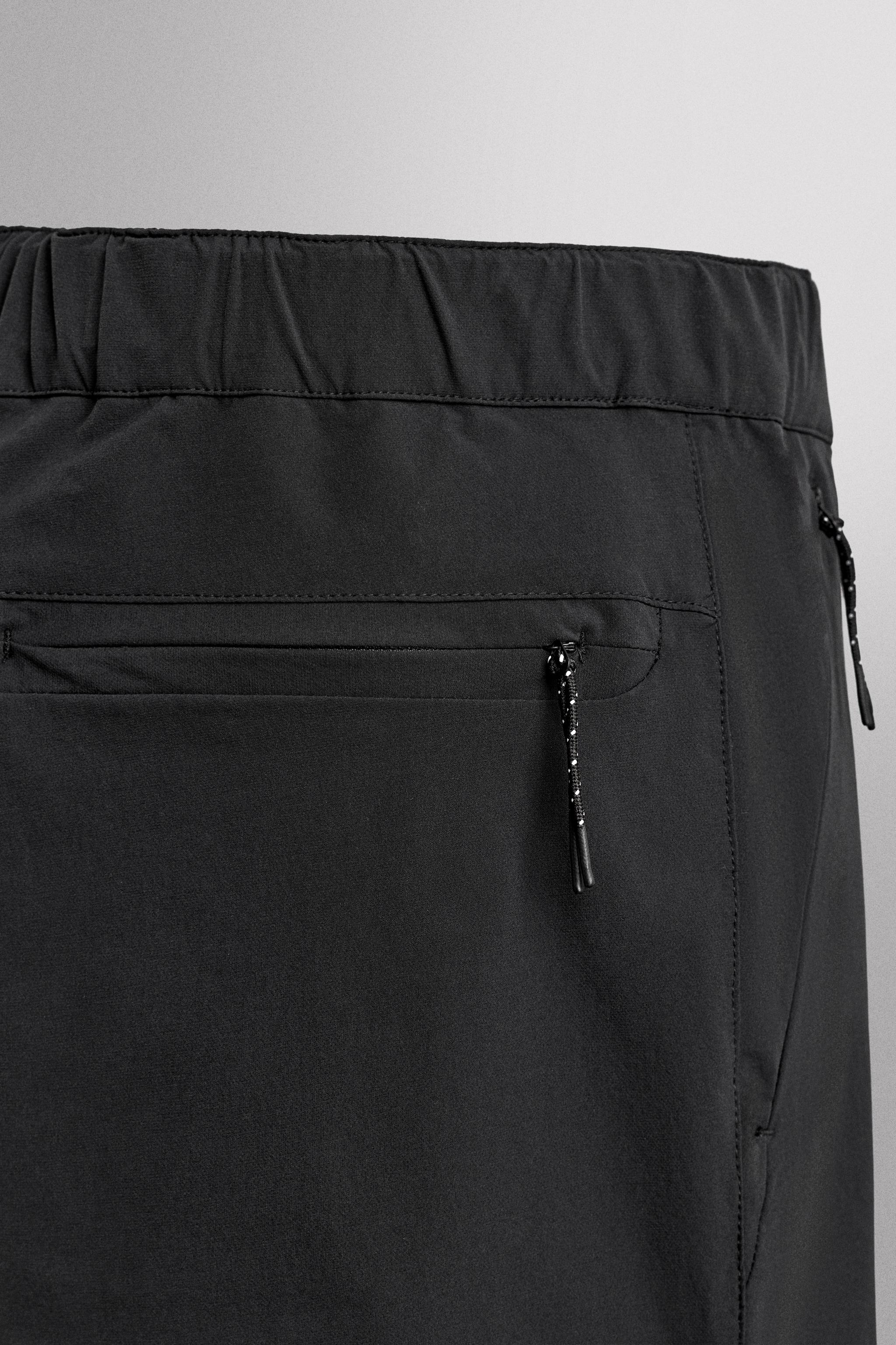 TECHNICAL PANTS WITH BELT